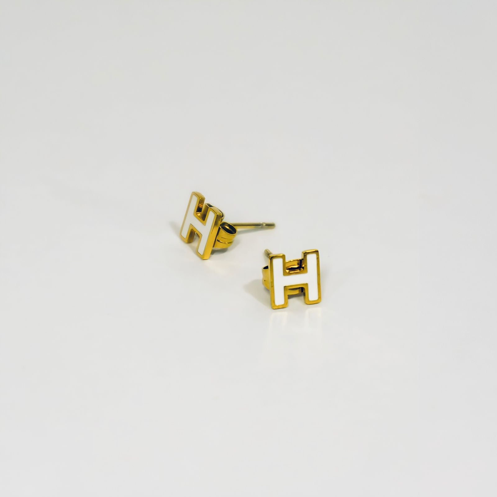 Aretes Topo H Blanco